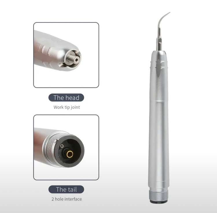 هندپیس اسکیلر اولتراسونیک متصل به شلنگ یونیت دندانپزشکی در حال آمادهسازی برای جرمگیری